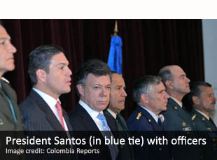 President Santos (in blue tie) with Colombian military officials