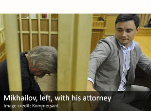Valery Mikhailov, left, with his attorney